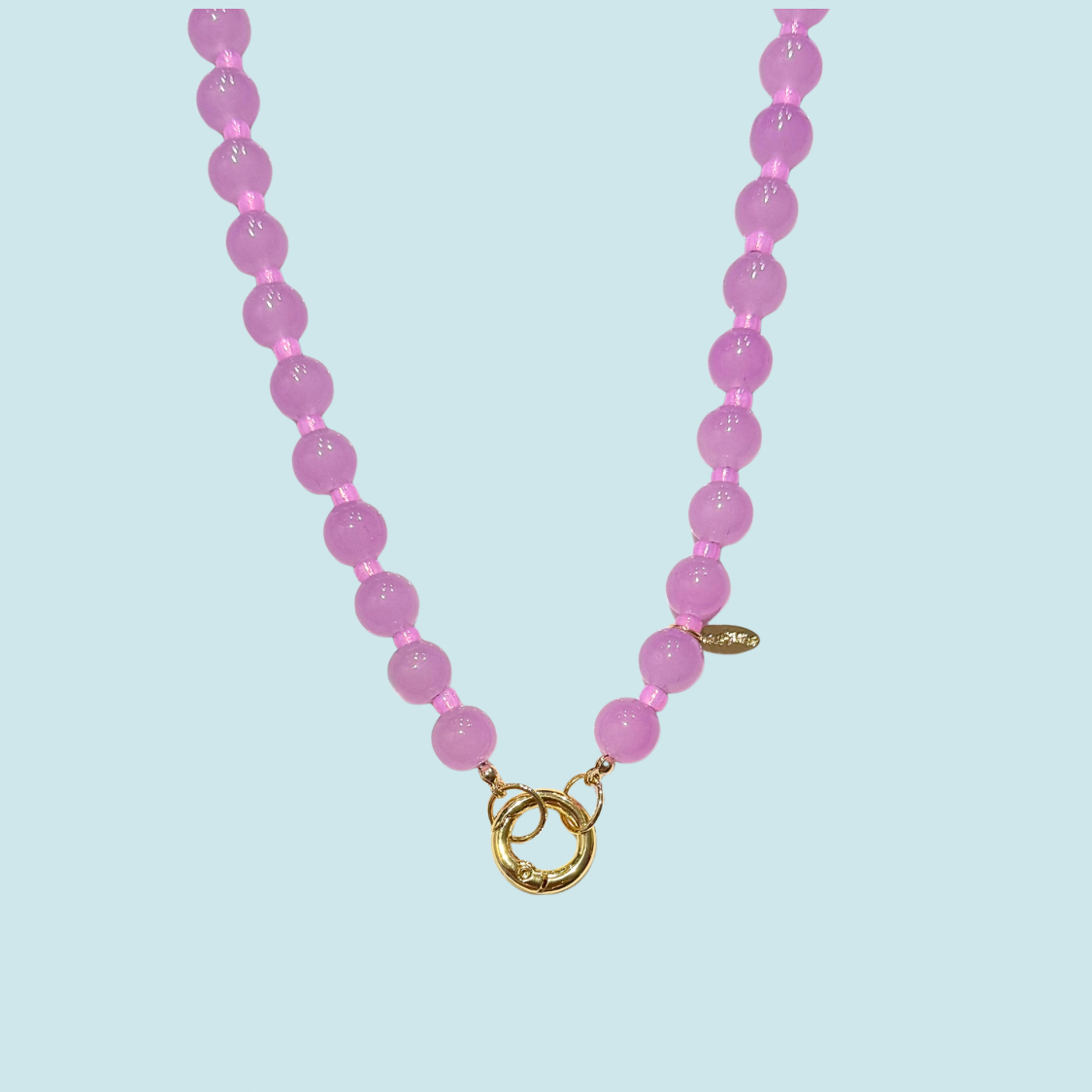 Pink glass beaded necklace with a gold clasp