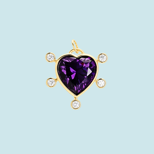 Heart-shaped purple gemstone pendant with gold accents 